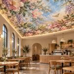 Floral ceiling mural with pink blossoms and sky in cafe interior